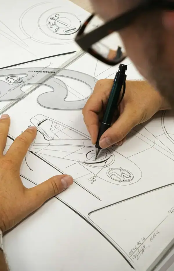 Designer sketching brand concepts